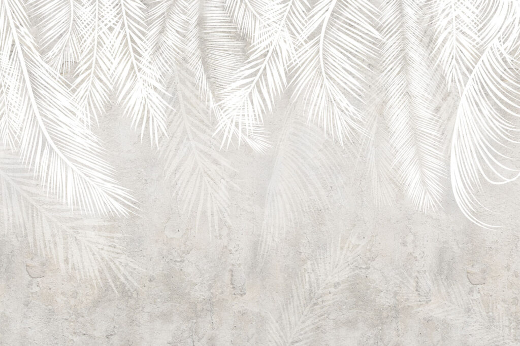 White leaves on a grey surface White leaves on a grey surface