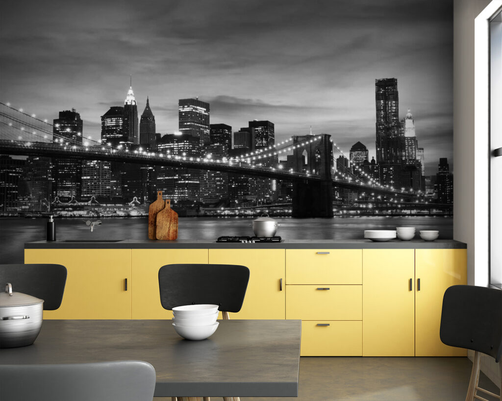 Bridge over water with city skyline in the background