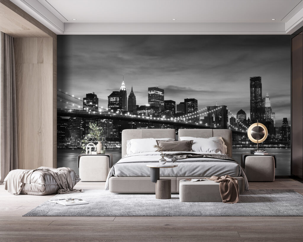 Bridge over water with city skyline in the background