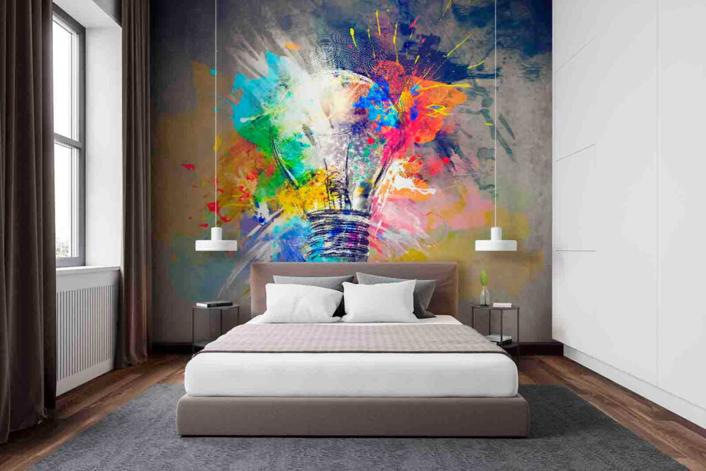 Light bulb with colorful paint splatters