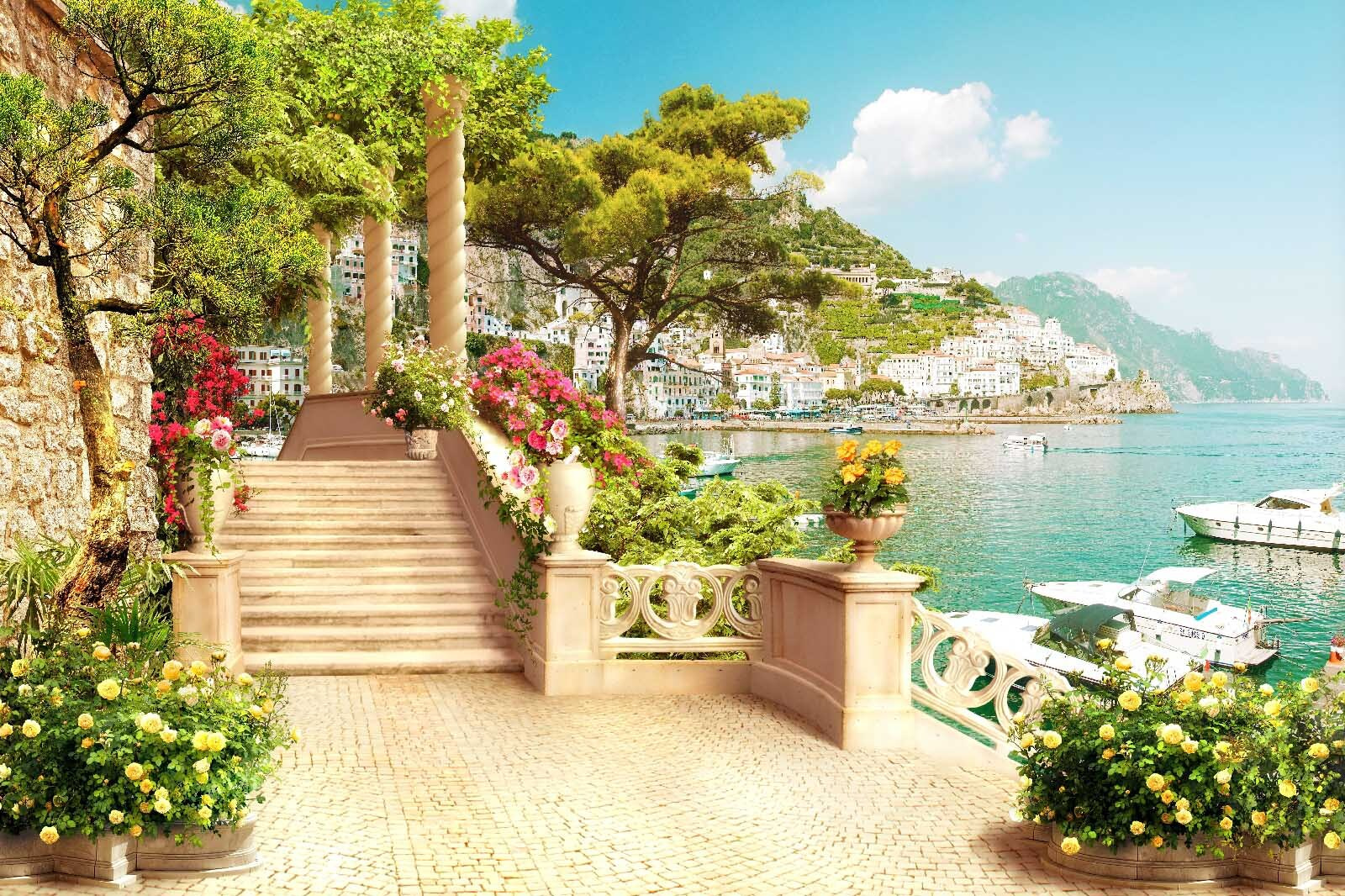 Stone staircase with flowers and trees on the side of the water