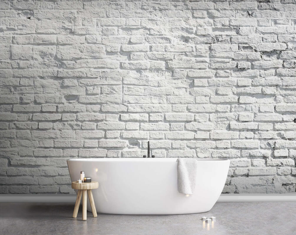 White brick wall with black spots White brick wall with black spots