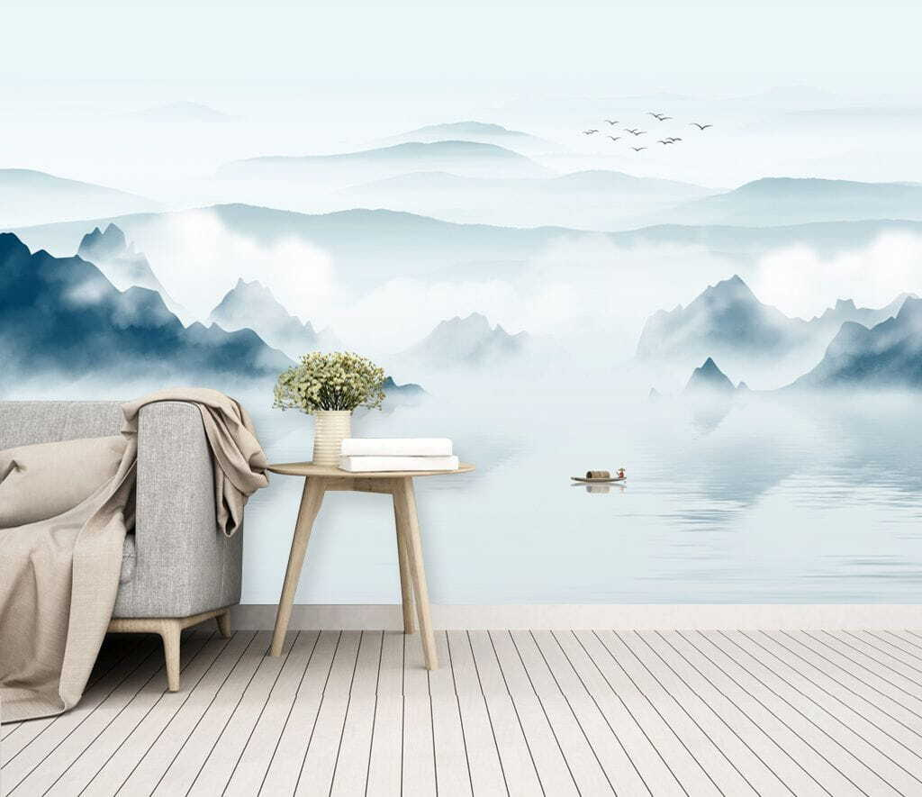 Boat in the water with mountains and birds flying
