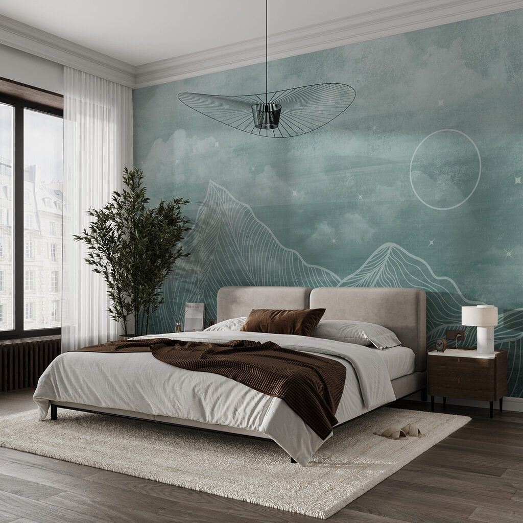 A mountain range with clouds and sun