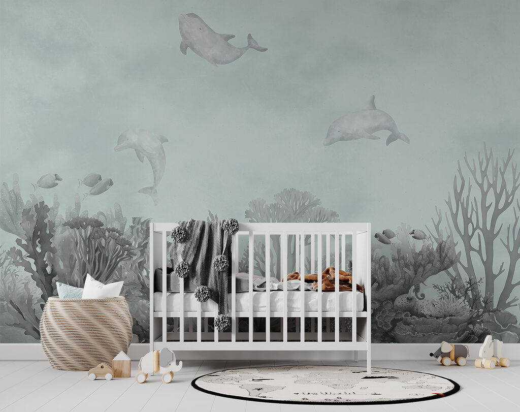 A group of dolphins swimming in the ocean