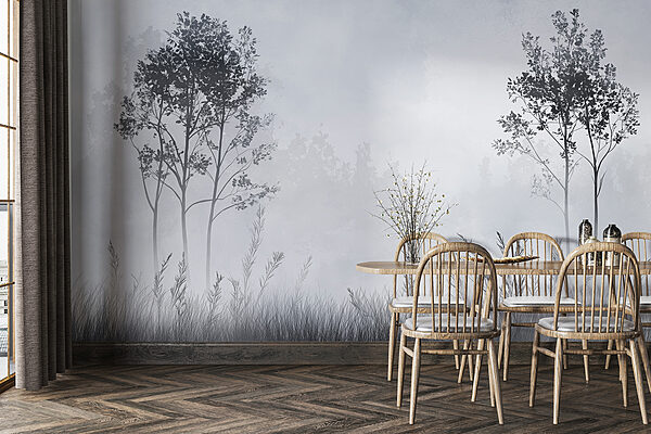 Foggy landscape with trees and grass