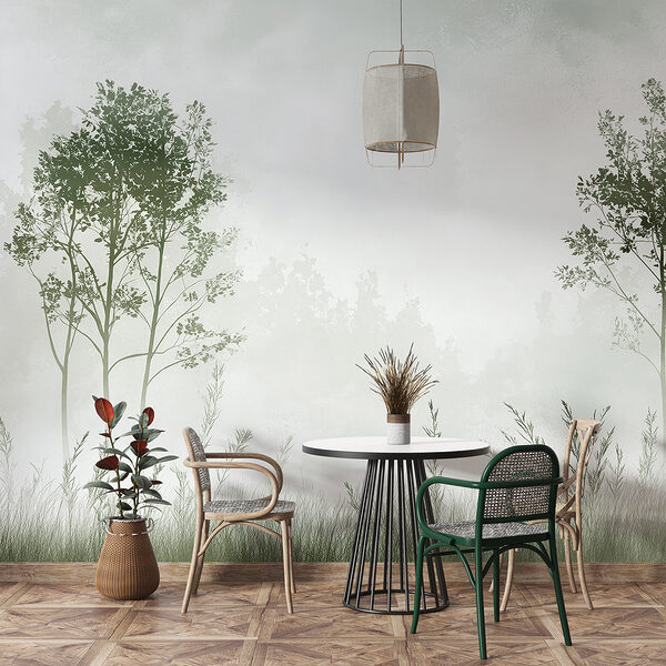 Foggy landscape with trees and grass