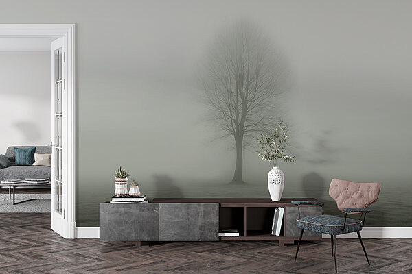 Tree in a foggy field