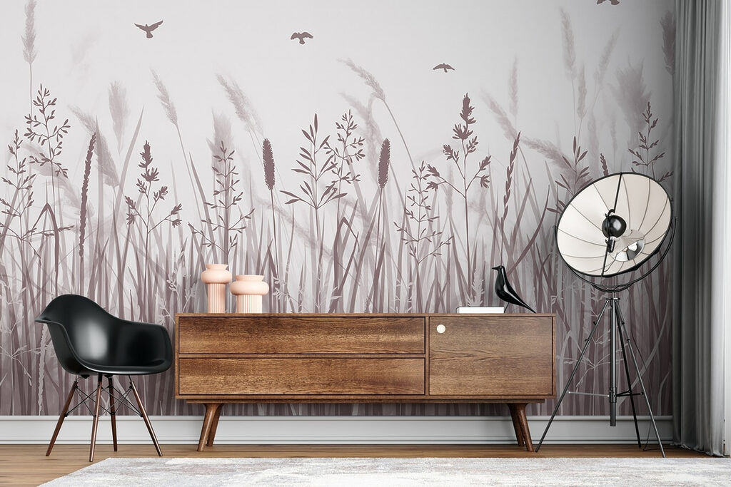 Field of grass with birds flying