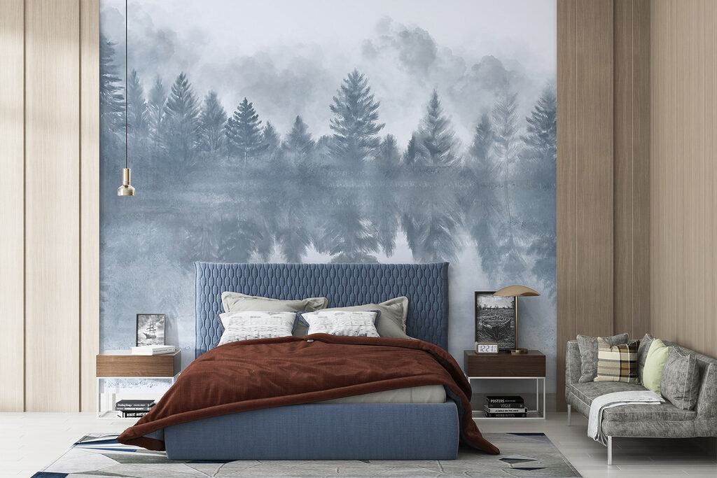 Foggy forest with trees reflected in water