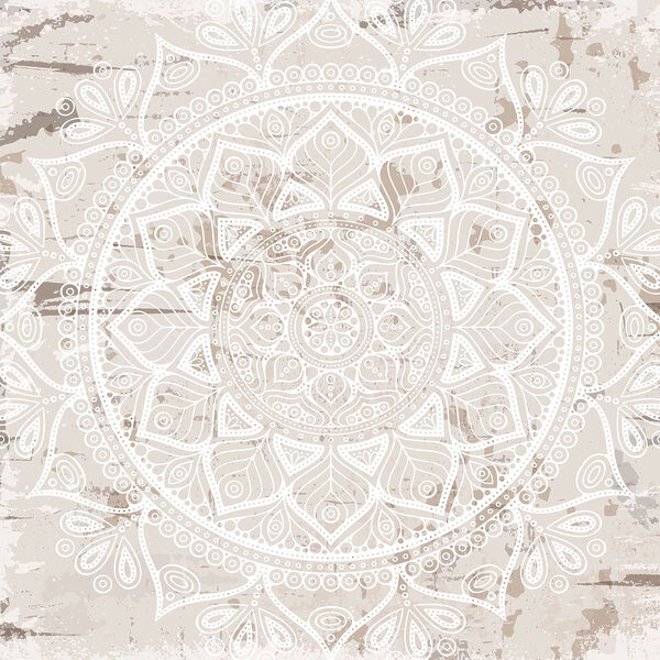 White mandala on a brown surface