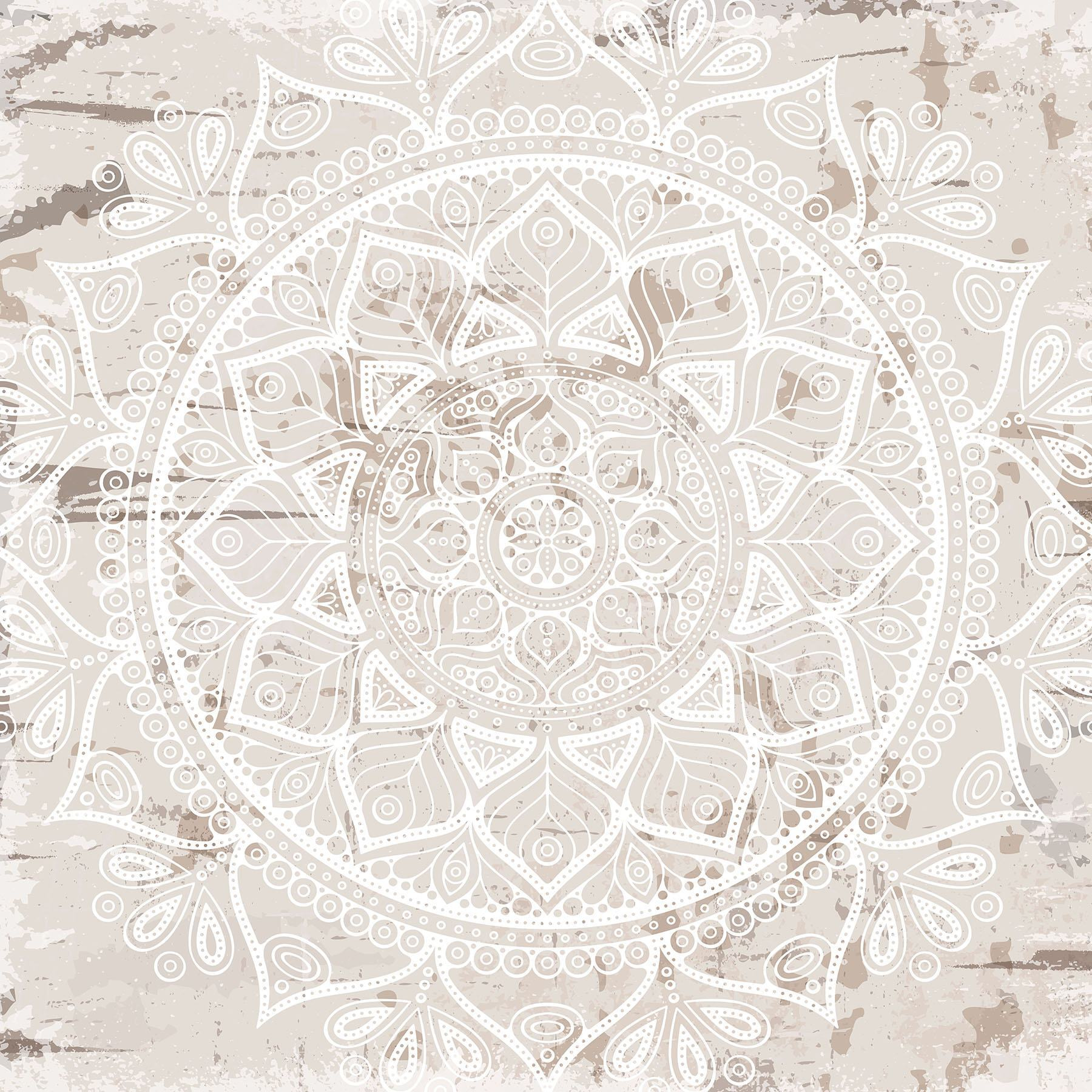 White mandala on a brown surface