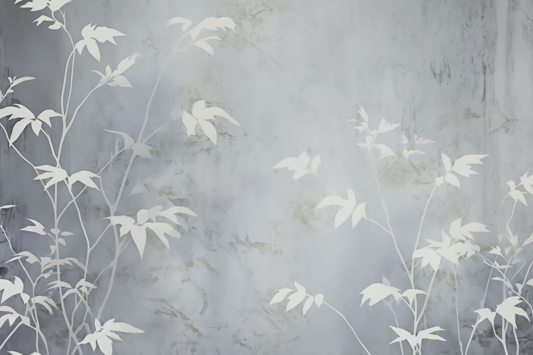 White leaves on a grey surface White leaves on a grey surface