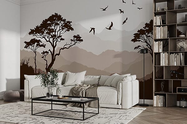 Birds flying over a mountain range