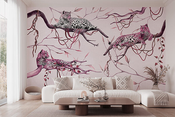 Group of leopards lying on a tree branch