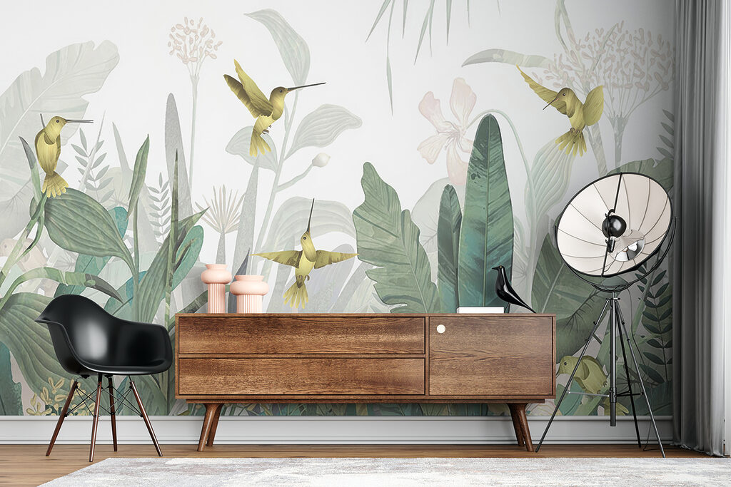 Hummingbirds flying over plants