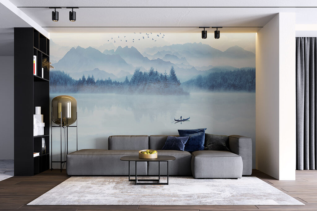 Person in a boat on a lake with birds flying in the sky