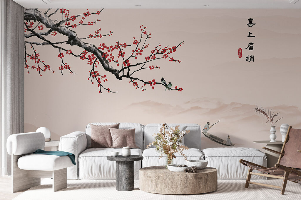 Tree branch with red flowers and a man on a boat