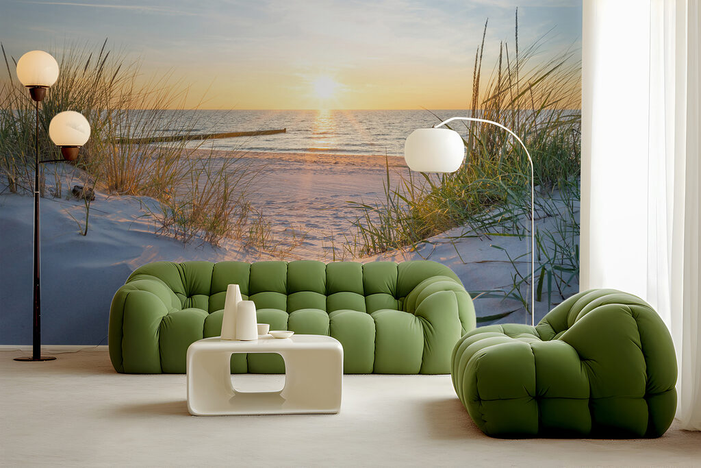 Beach with grass and a body of water