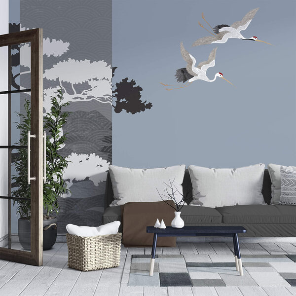 Ζευγάρι γερανών που πετούν δίπλα σε ένα δέντρο Ζευγάρι γερανών που πετούν δίπλα σε ένα δέντρο