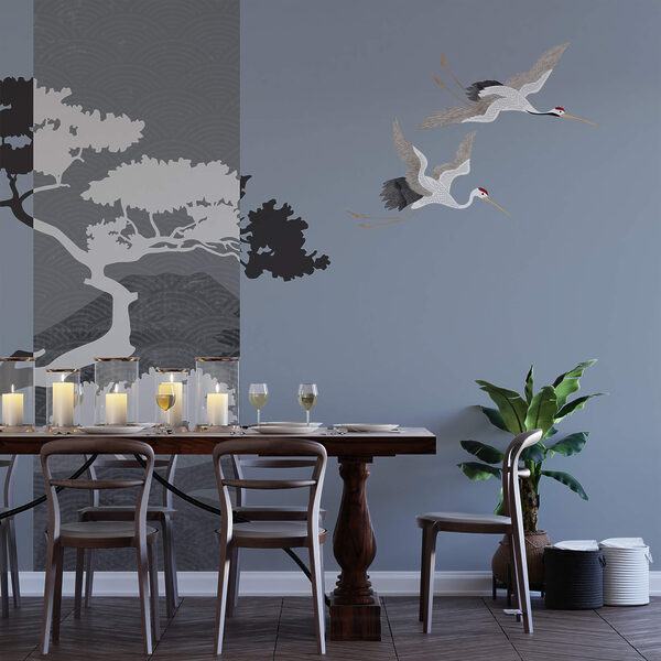 Ζευγάρι γερανών που πετούν δίπλα σε ένα δέντρο Ζευγάρι γερανών που πετούν δίπλα σε ένα δέντρο