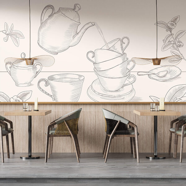 Τσαγιέρα που χύνει σε μια στοίβα από φλιτζάνια τσαγιού