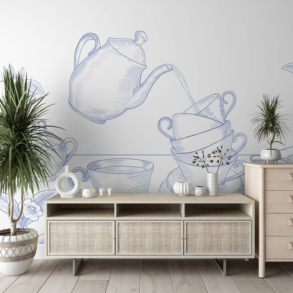 Τσαγιέρα που χύνει σε μια στοίβα από φλιτζάνια τσαγιού