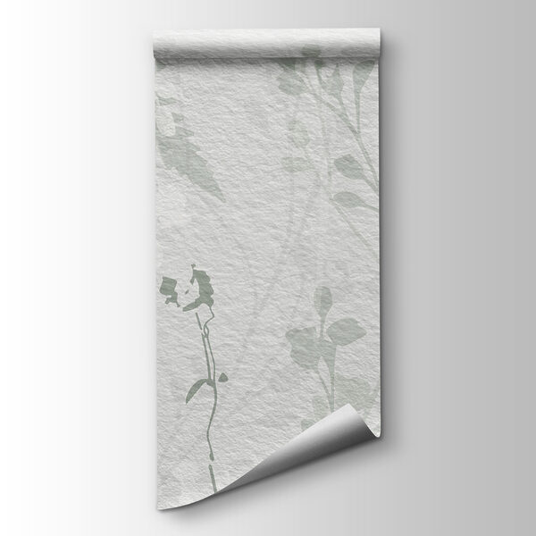 White wall with green leaves