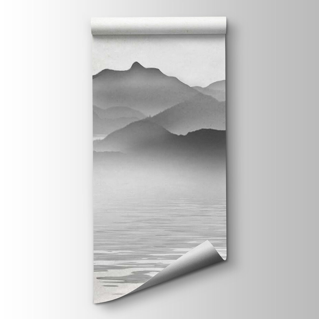 Boat on water with mountains in the background