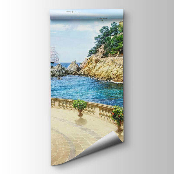 Balcony with columns and flowers on the side of the ocean