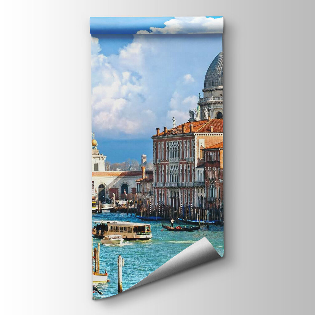 Water way with boats and buildings in the background Water way with boats and buildings in the background