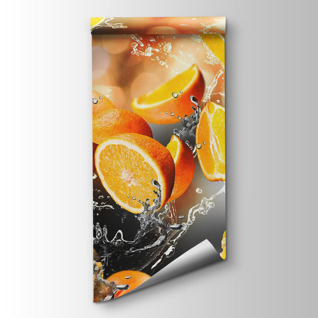 Oranges falling into water with water splashing