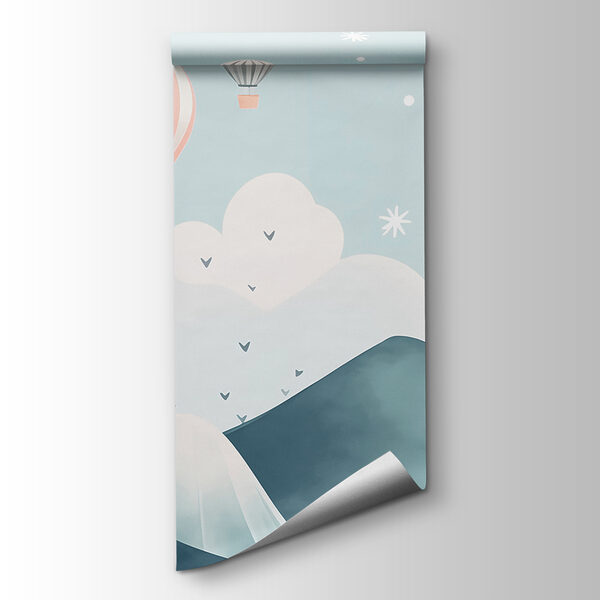 Hot air balloons flying over mountains