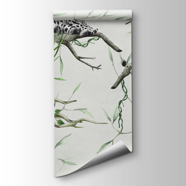 Group of leopards lying on branches