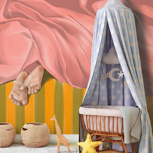 Ζευγάρι πόδια κάτω από μια ροζ κουβέρτα